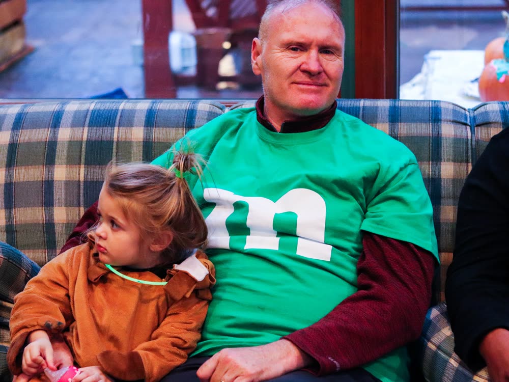 Daniel Conway with a grandchild